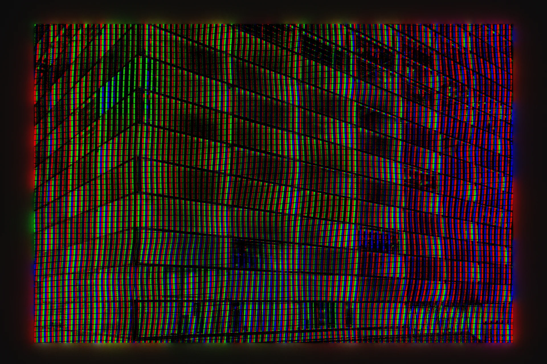 Gebäudefassade, aufgelöst in ein Raster aus roten, grünen und blauen Pixeln